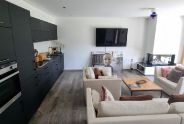 Modern apartment with a view terrace and a buildable plot